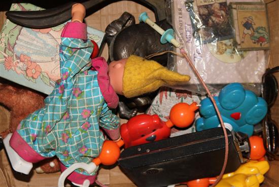 Various toys and two bronze dog nutcrackers, camera and sunglasses